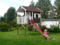 Preview: Spielende Kinder am Stelzenhaus Janson XL im Garten